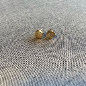 Gold stud earrings